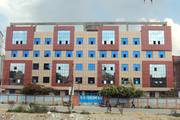 The external view of the school building at Dibya Deep Jyoti English Secondary School.