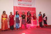 Students showcasing cultural performances during the welcome program for newly enrolled students.