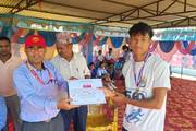 Honoring the school students winning the Letang-level inter-school athletics games