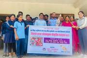 Students and staff participating in an awareness campaign to advocate against child marriage.