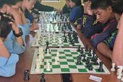 Students participating in chess competition