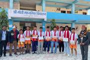 Shree Moti Secondary School awards high-achieving students during its Parents Day program.