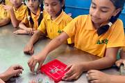 children busy playing indoor games