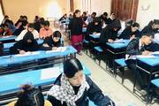 Students of class 11 and 12 attending the second internal examination