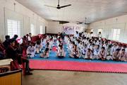 Students of Laxmi Secondary School participating in a karate training session.
