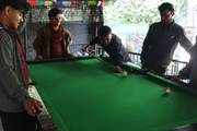 Students enjoy a friendly game of pool.