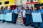 Students participating in a nutrition exhibition and awareness program