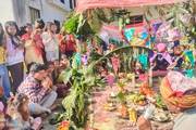 Teachers and students celebrating Saraswoti Puja in the school