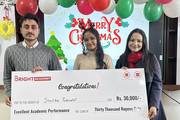 A student is awarded a scholarship of Rs. 30,000 for outstanding academic performance.