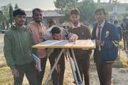 Civil engineering students doing survey