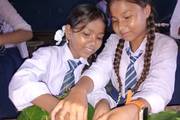 Students learning skills to make Tapari from leaves