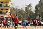 Students playing volleyball in the school ground
