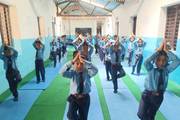 students practicing yoga