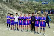 Team Spirit: The Volleyball Team Ready for Action.