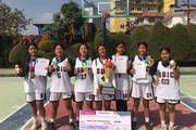 Winners of the 1st HISSAN President Cup Basketball Tournament posing with their championship trophy and certificates.